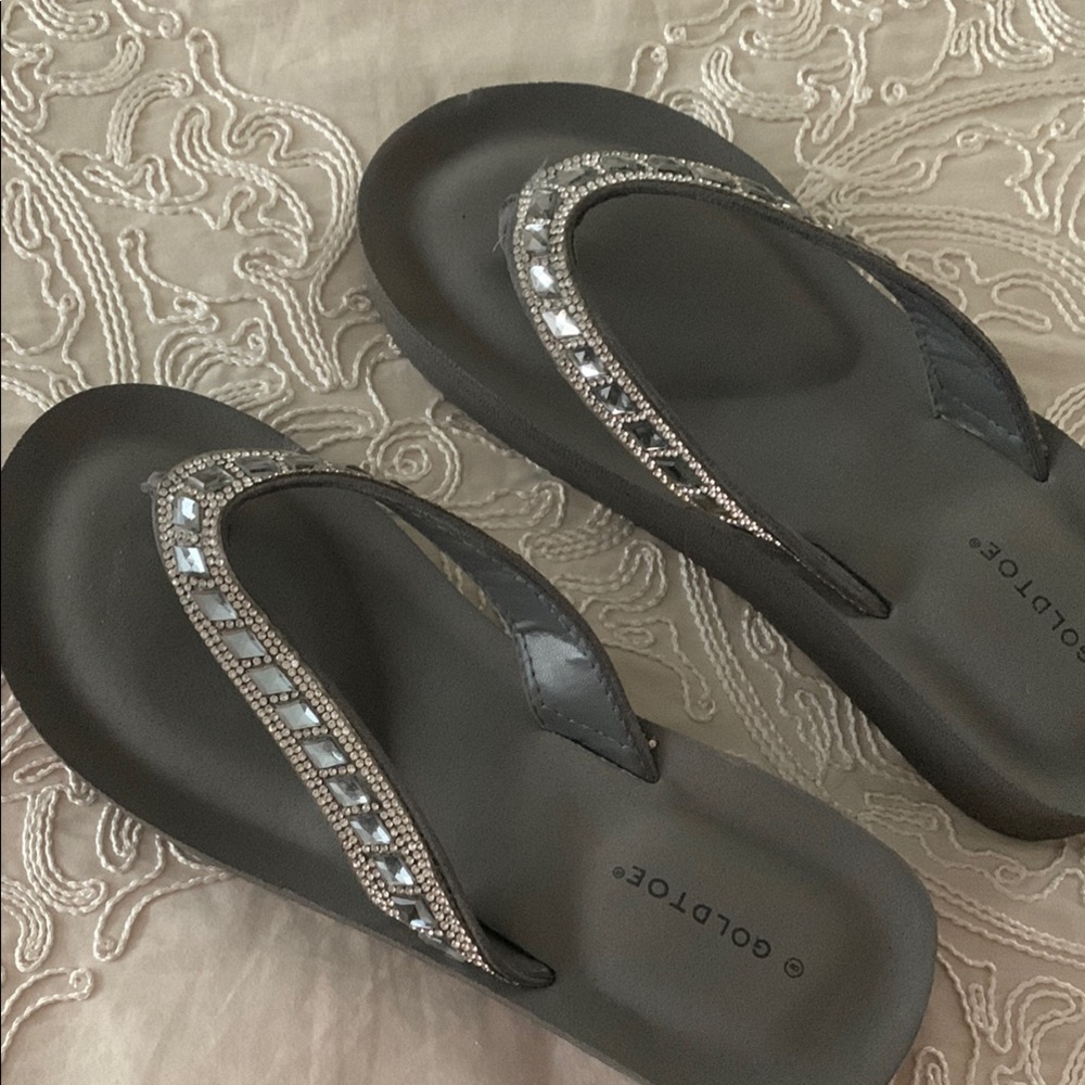 Gold Toe Black Sandals with Metallic Accents